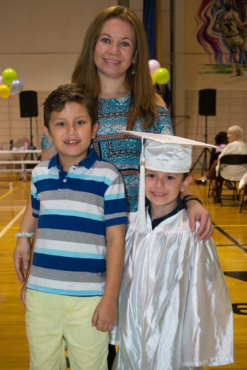 Lina Bernal with her sons, Miguel and Gabriel.
