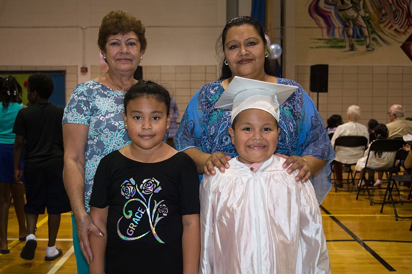 Danae and Hansel Amador with their mother, Rocio Delgado, and their grandmother Maria Teresa Martinez.