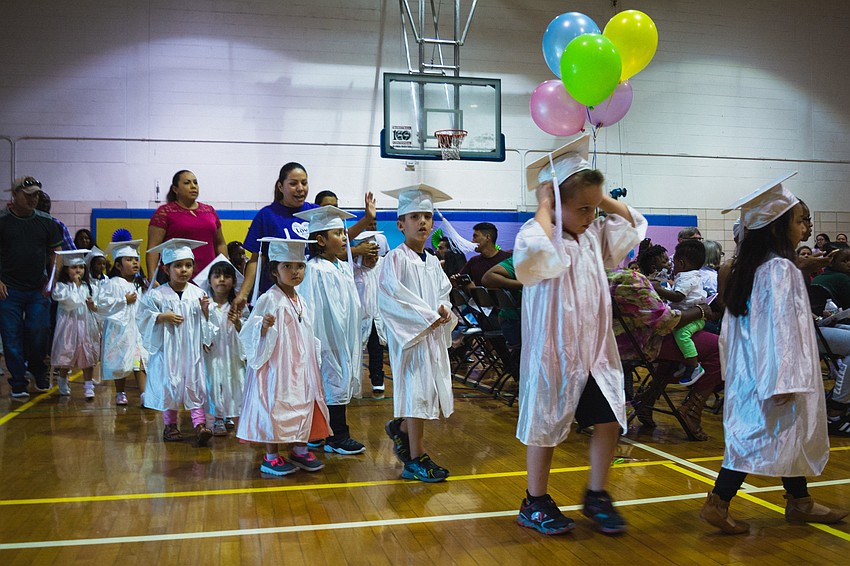 HIPPY graduates during their graduation processional.