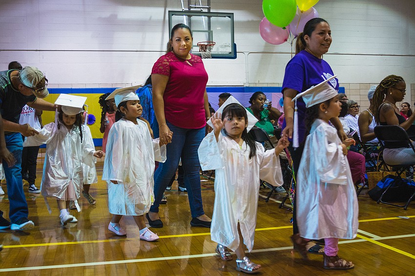 HIPPY graduates during their graduation processional.
