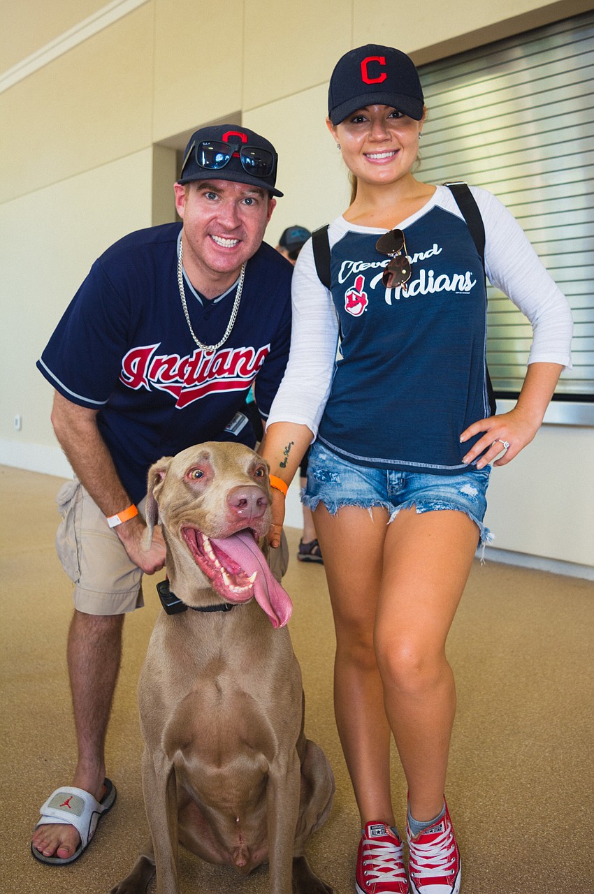 Brent Willey and Alina Belova bring their dog, Grady, to the ballpark.