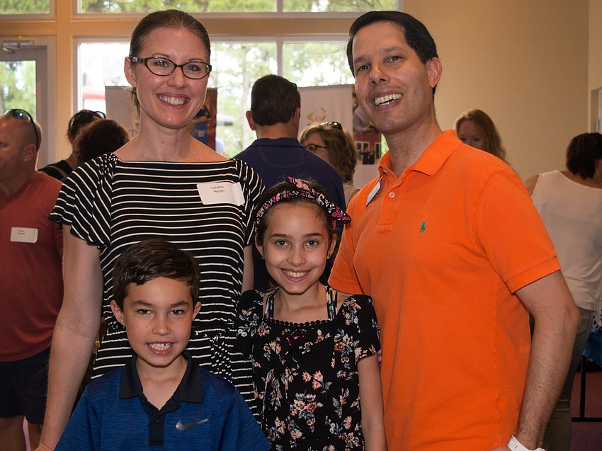 Lauren and Brian Hersh with their children, Lillian and Gideon.