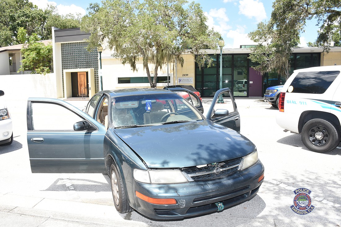 The Nissan was parked in the sun for about 25-30 minutes. (Sarasota PD photo)
