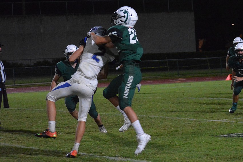 Junior cornerback Jake Zapatha breaks up an Ida Baker pass.