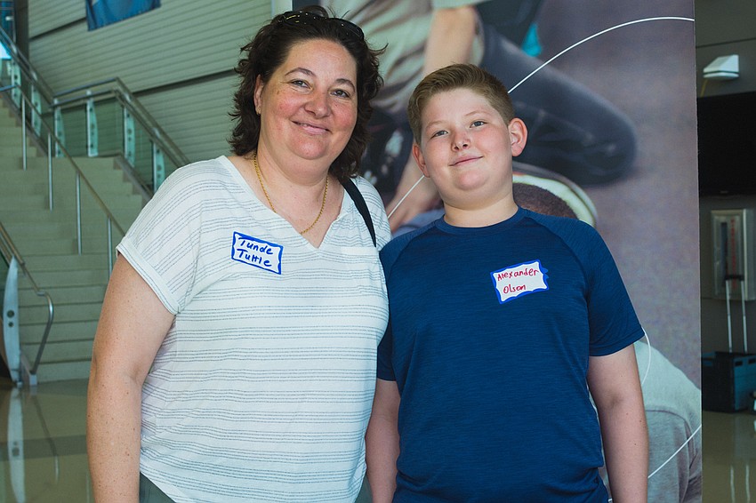 Tuttle Elementary teacher Tunde Olson with her son, Alex.