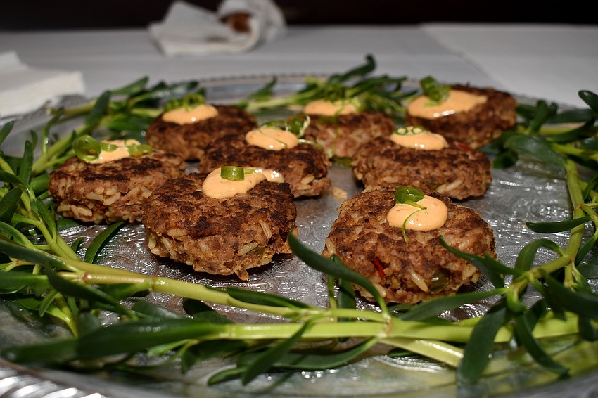 Appetizers, such as stingray boudin, were served to guests during the reception.