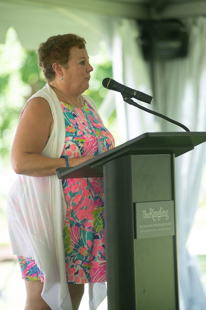 Betsy Bolger speaks on behalf of the Bolger family. Betsy was the first to suggest the reflection pool.  Photo by Daniel Perales.