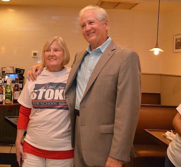 Linda Stokes celebrates her husband Joe&#39;s showing in the school board election. He moves to a runoff against incumbent Scott Hopes in November.