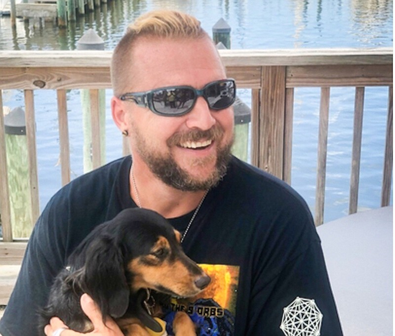Shane Hale is reunited with his dog, Harley, after they were separated in a storm 3 miles off of Englewood.