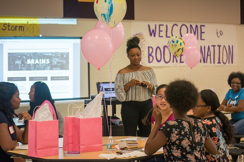 Nzinga Lowe guides participants through a workshop on learning styles.