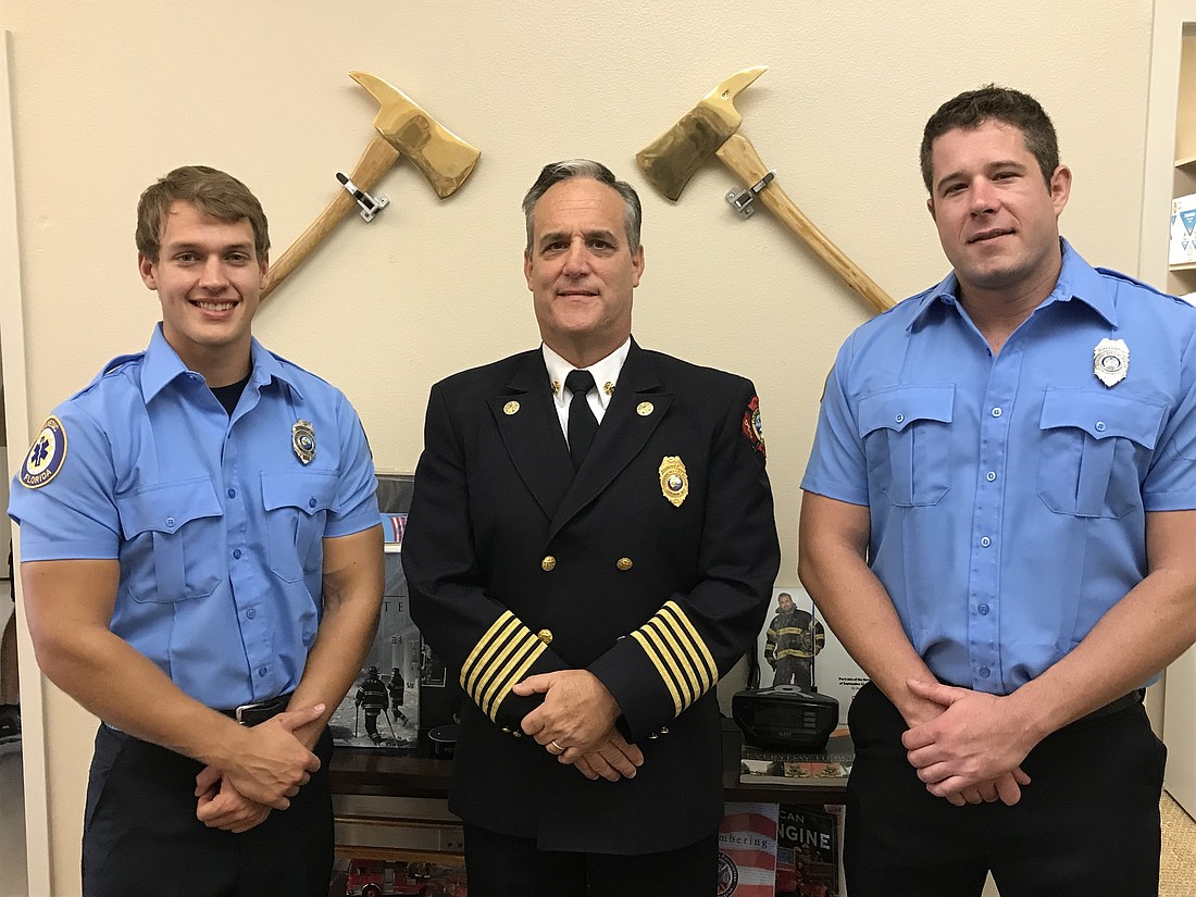  David Oliger, Fire Chief Paul Dezzi and  Zach Schield. Courtesy photo