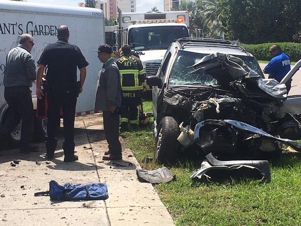 Police closed Gulf of Mexico Drive for 15 minutes while clearing the wreckage of a two-car collision.