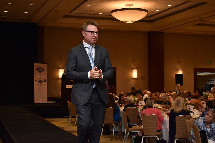 Sponsors walk the runway.