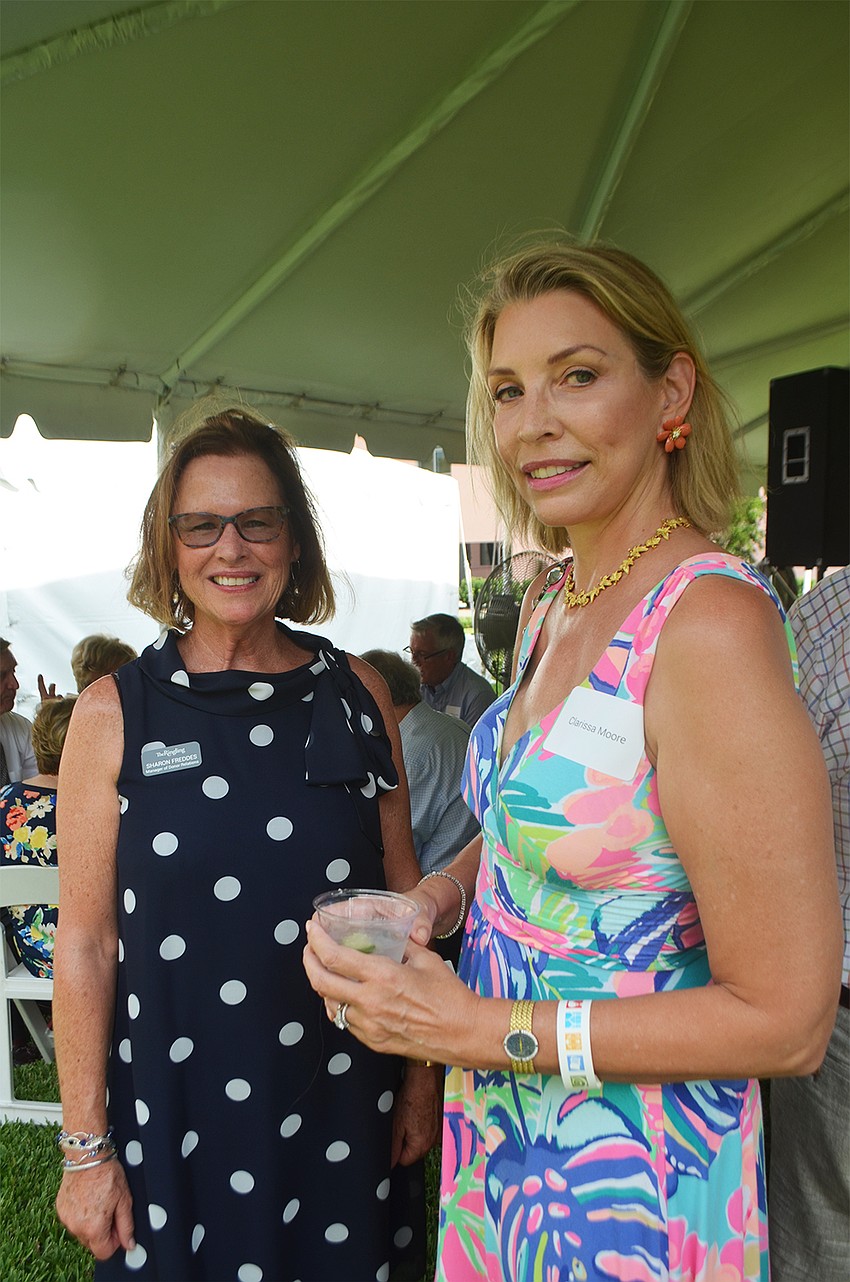 Sharon Freddes, the manager of donor relations for the Ringling, and Clarissa Moore