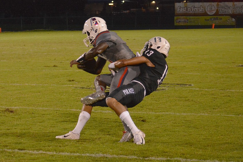 Braden River senior cornerback Jean Lugo-DeJesus makes the tackle on a Manatee High receiver.