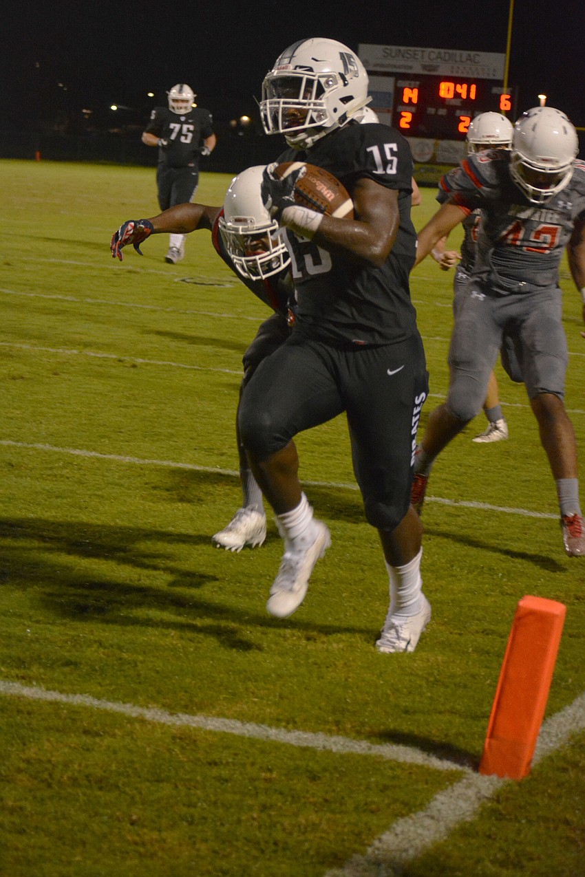 Braden River senior wide receiver Knowledge McDaniel busts through the Manatee defense for a touchdown. The game was his first of the season.
