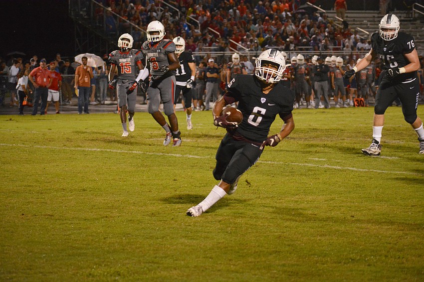 Braden River junior running back Brian Battie scores his second of three touchdowns on the night.