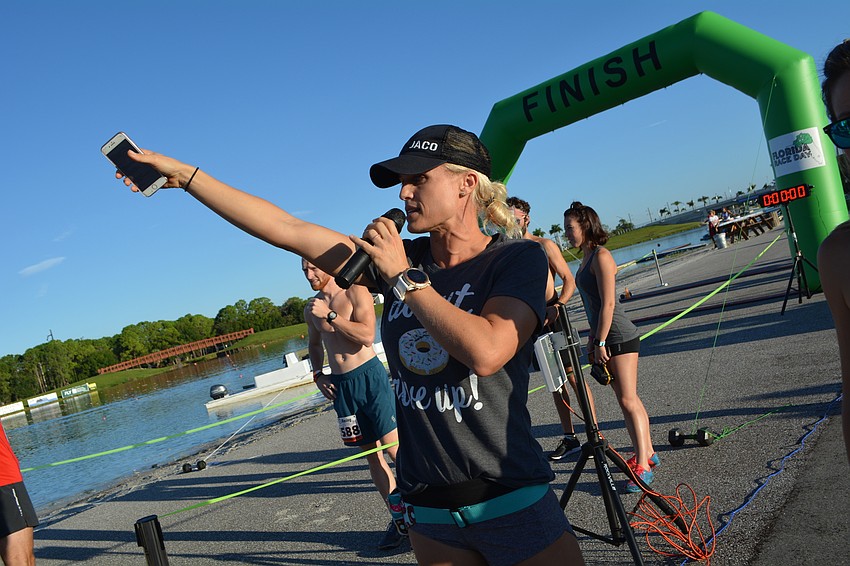 Co-race director Kelli Jaco, who owns Jaco Boxing & Fitness, tells runners about the course.