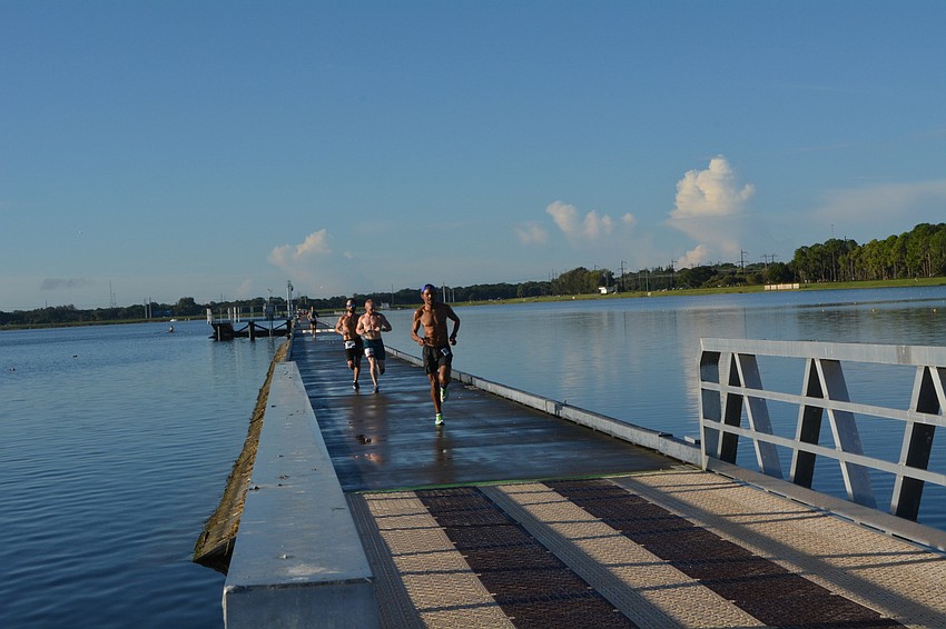 Runs make their way across the attenuation bridge and prepare to complete the first half of the 10K.