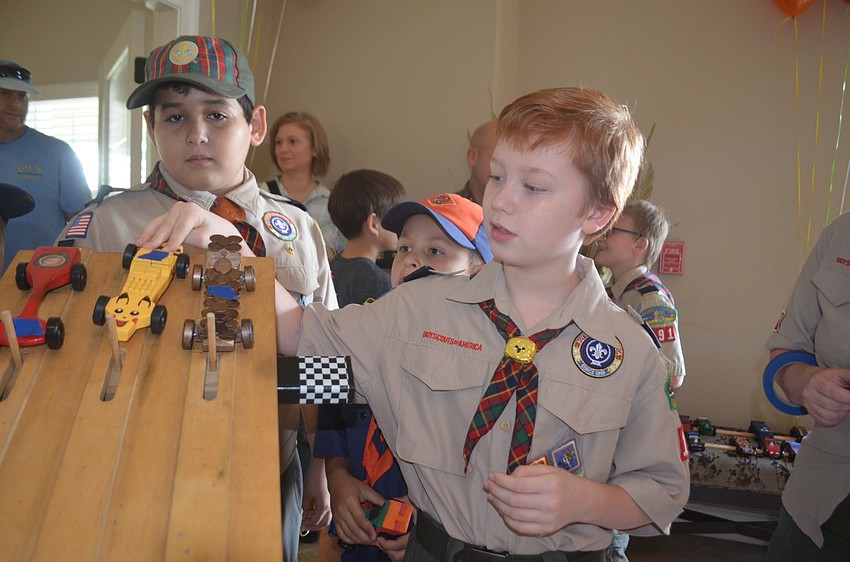 Gabriel McFadden, 8, says that he painted his car to look like Pikachu from Pokemon because that's his favorite character.