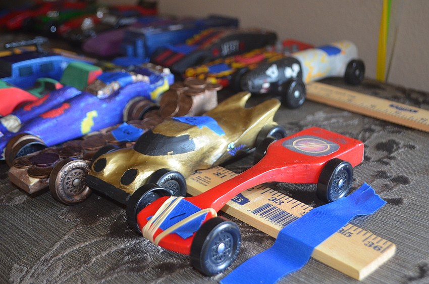 The Cub Scouts brought derby cars for exhibition races  that have very unique designs, like a thin front to the car.