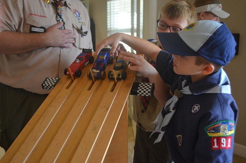 Drake Trombetta, 8, says that lining up the cars in the beginning of the race gives them a better start.