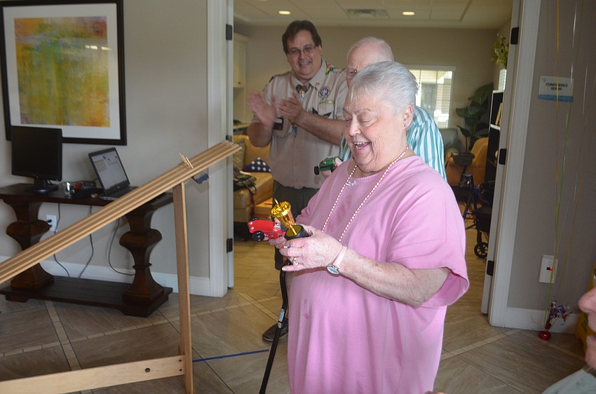 Brenda Franzese, the winner of the race, says that the googly eyes she glued on her car probably brought her good luck.