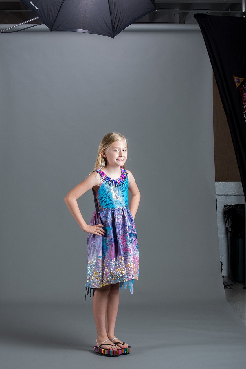 Cyan Barrett wears her outfit inspired by her love of arts and crafts.