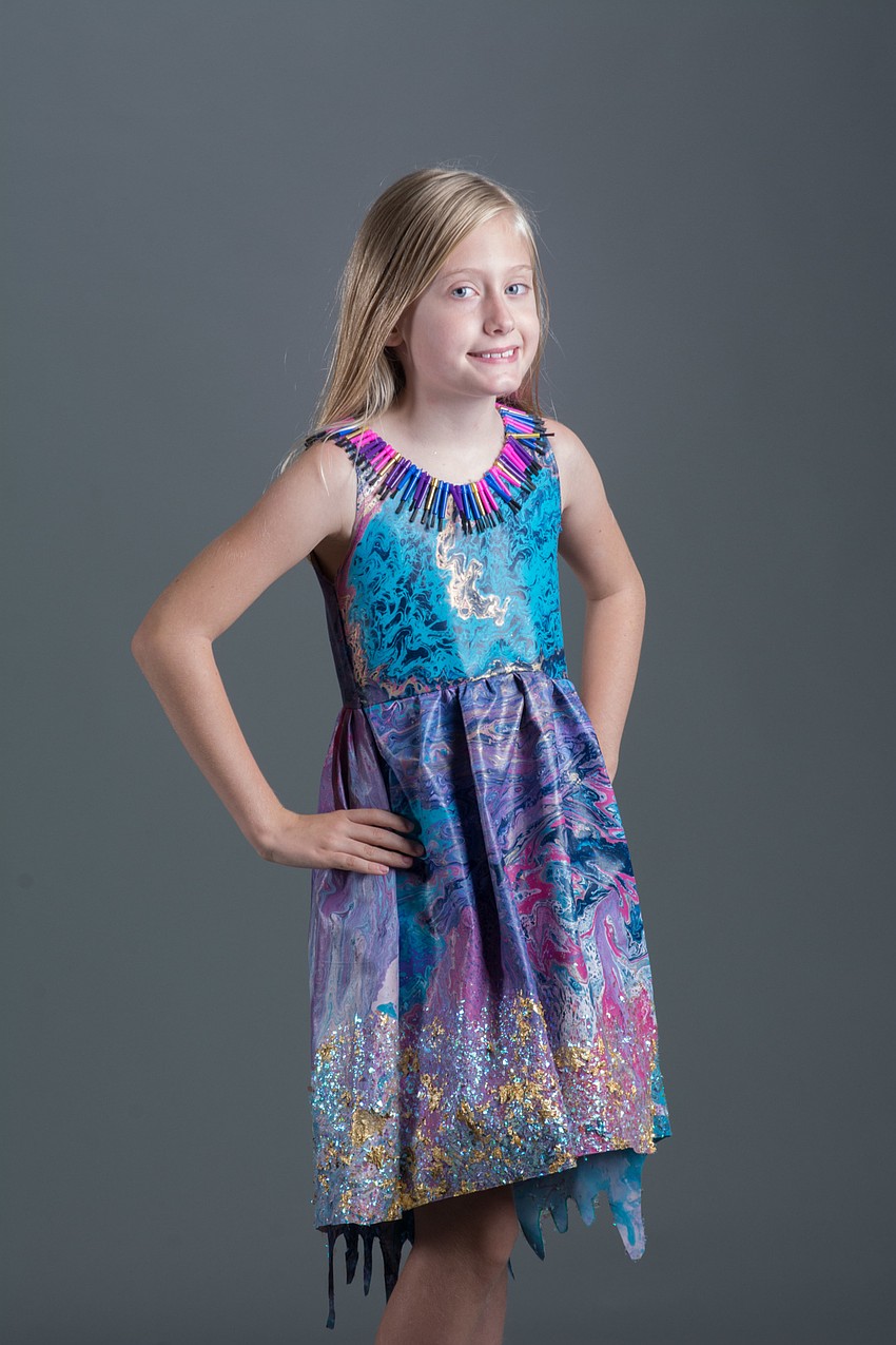 Cyan Barrett wears her outfit inspired by her love of arts and crafts.