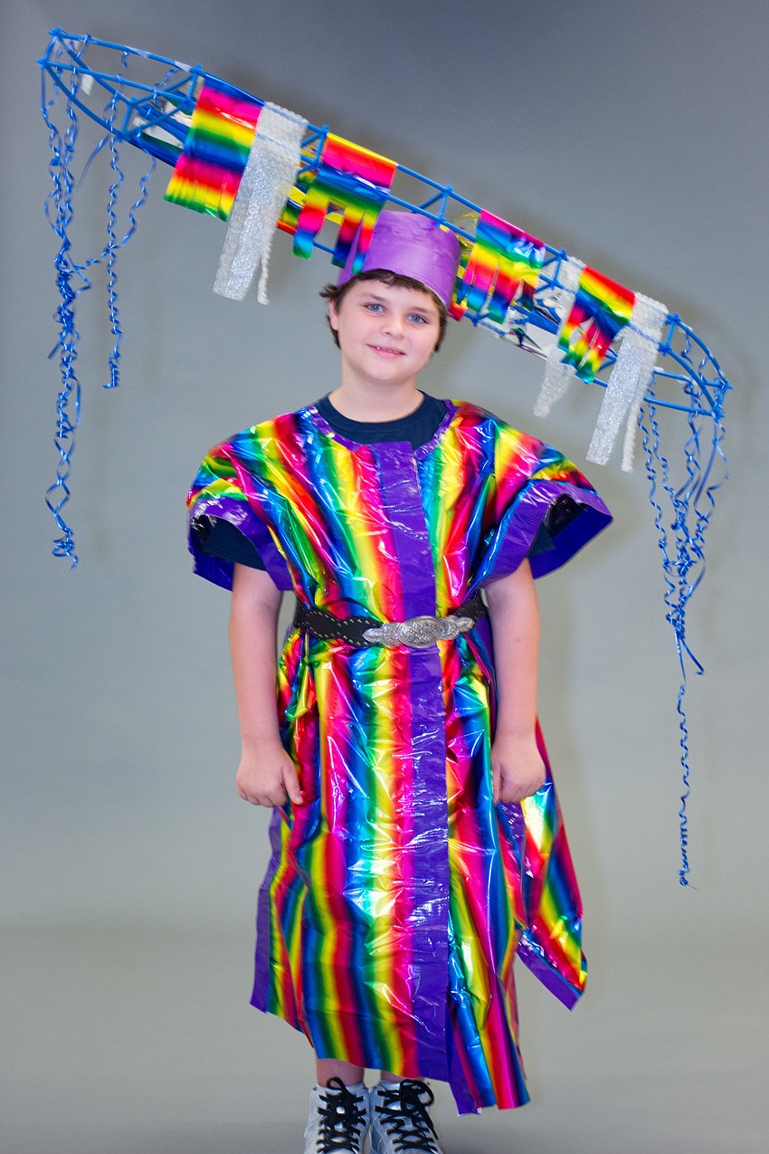 Kennedy Cole models an outfit designed by his twin brother, Avery Cole.