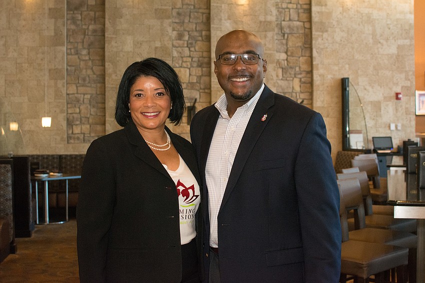 Blooming Impressions founder Olympia Baylou with Kappa Alpha Psi's Keenan Wooten.