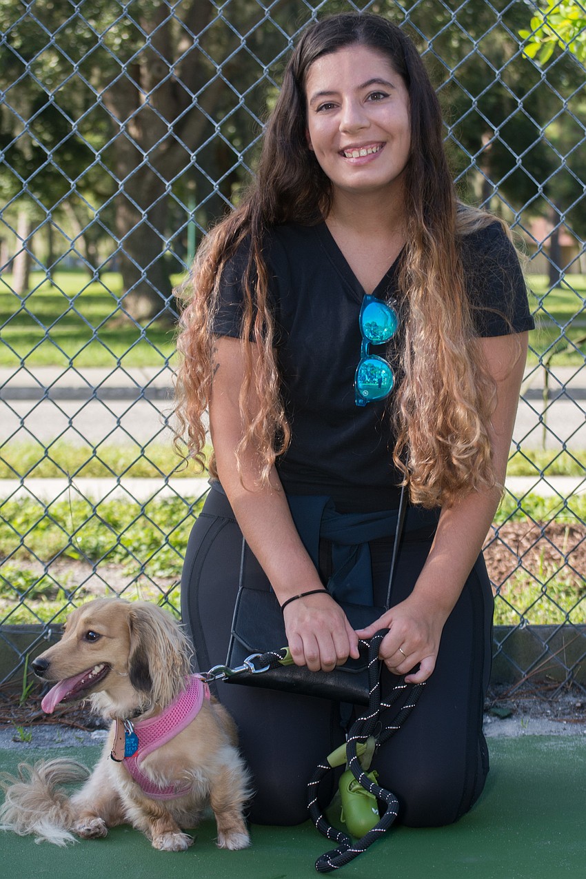 Malena Munford with her dachshund, Lana.