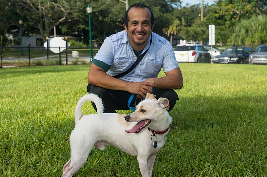 Will Luera with his dog, Buzz.
