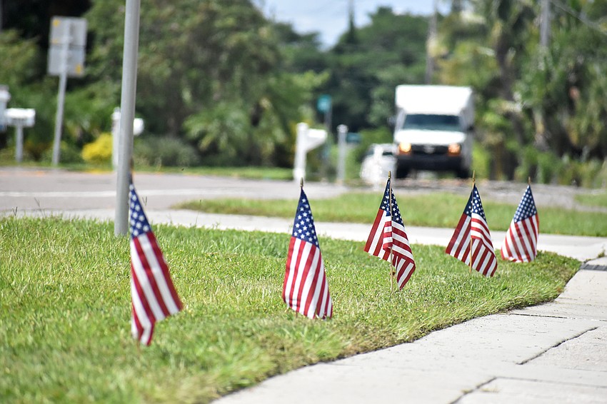 The 2,977 flags will remain standing all day on Sept. 11 and will be taken down the next day.