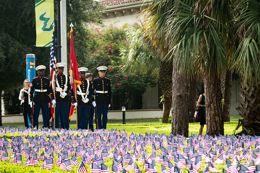 The USF Sarasota-Manatee campus lawn was lined with 2,977 small American flags, one for each 9/11 victim.
