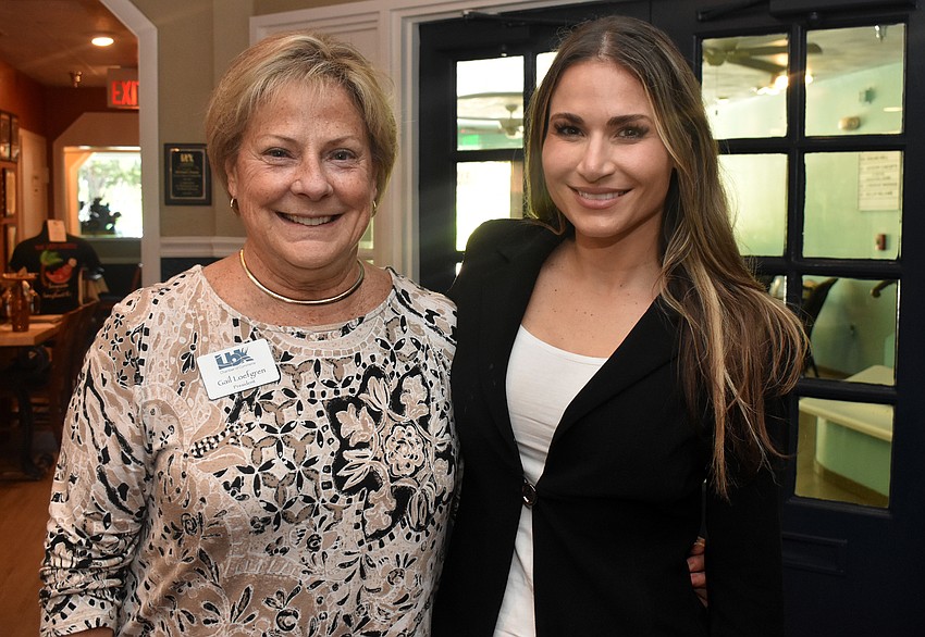 Longboat Key Chamber of Commerce President Gail Loefgren and Mote Marine Laboratory scientist Tracy Fanara