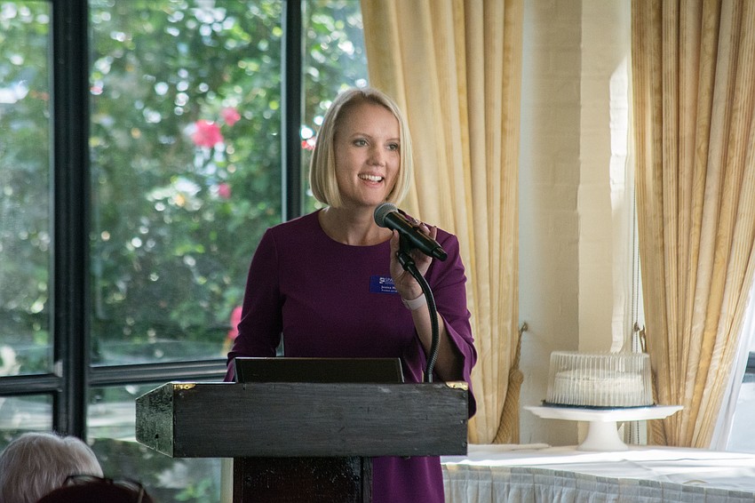 SPARCC President Jessica Hays speaks to the organization's fundraising volunteers.