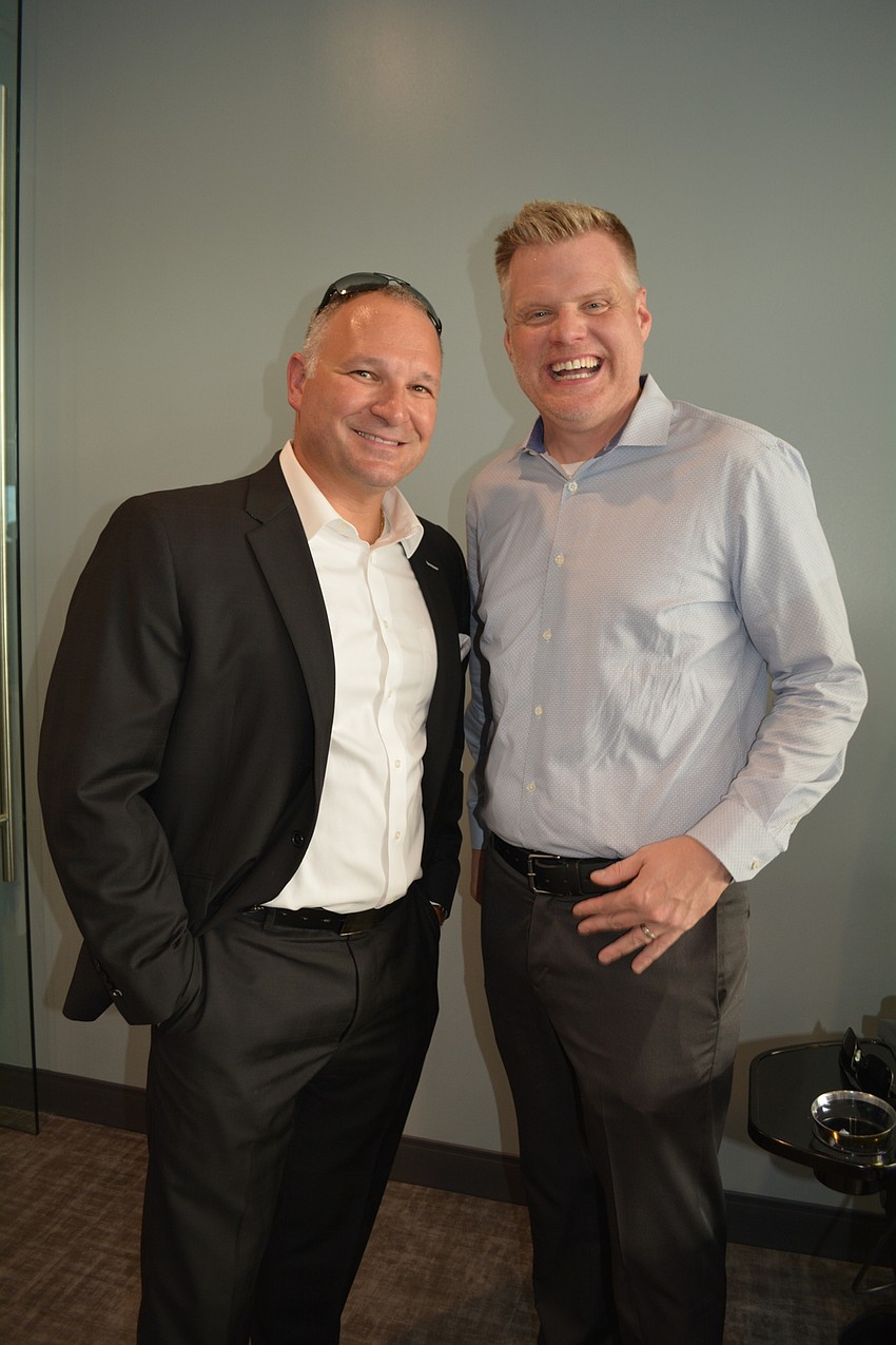 U.S. Trust's T.J. Kornett and Tim Estep, of the Manatee Chamber of Commerce, enjoy networking.