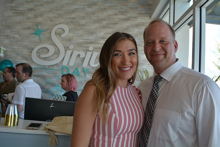 Sarasota's Ashley and James Guttridge came out to support their friends.