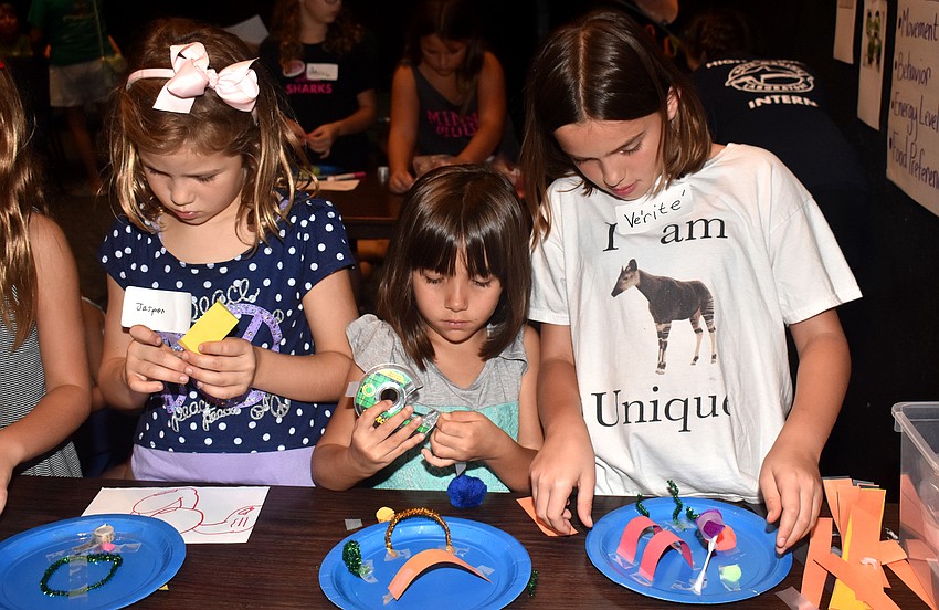 Jasper Ernst and Avellyn and Ve’Rite’ Molinaro create their own replica shark tanks.