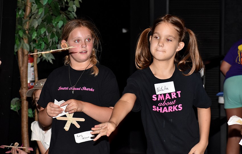 Rory Brown and Natalia Rechtorik test out their shark planes.
