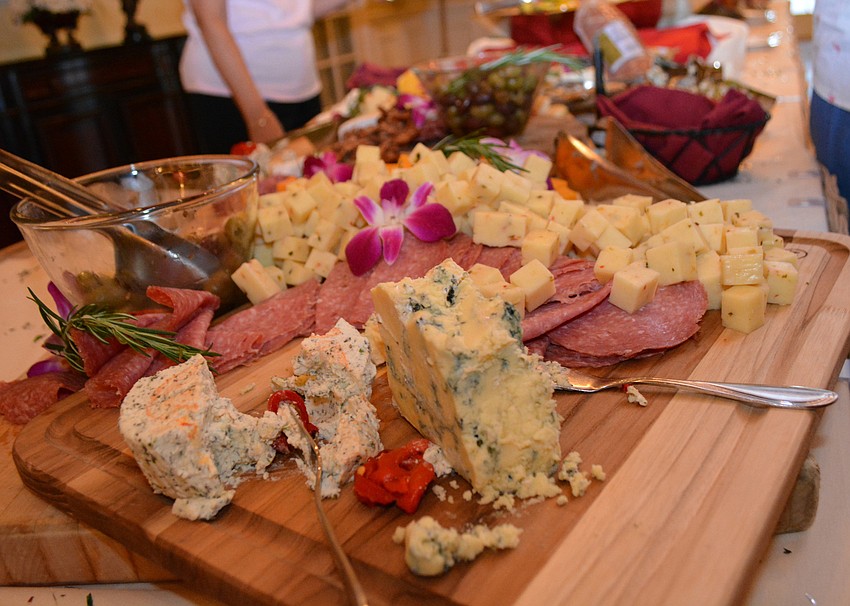 Guests enjoyed a spread of meat and cheese and other Italian eats.
