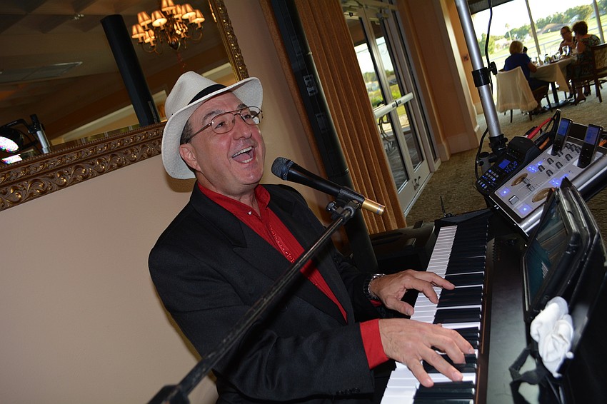 Musician Rob Satori performs live for the crowd.