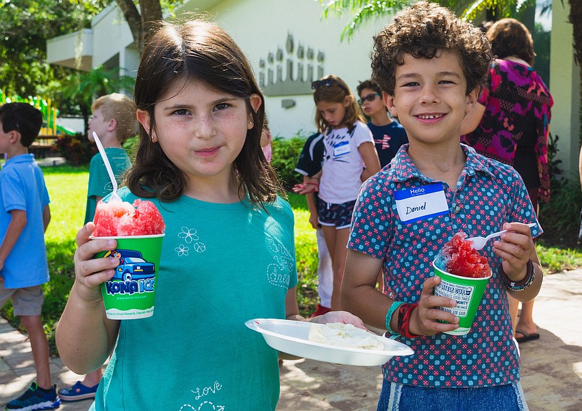 Brooke Feldman and Daniel Lewis enjoy treats from Kona Ice.
