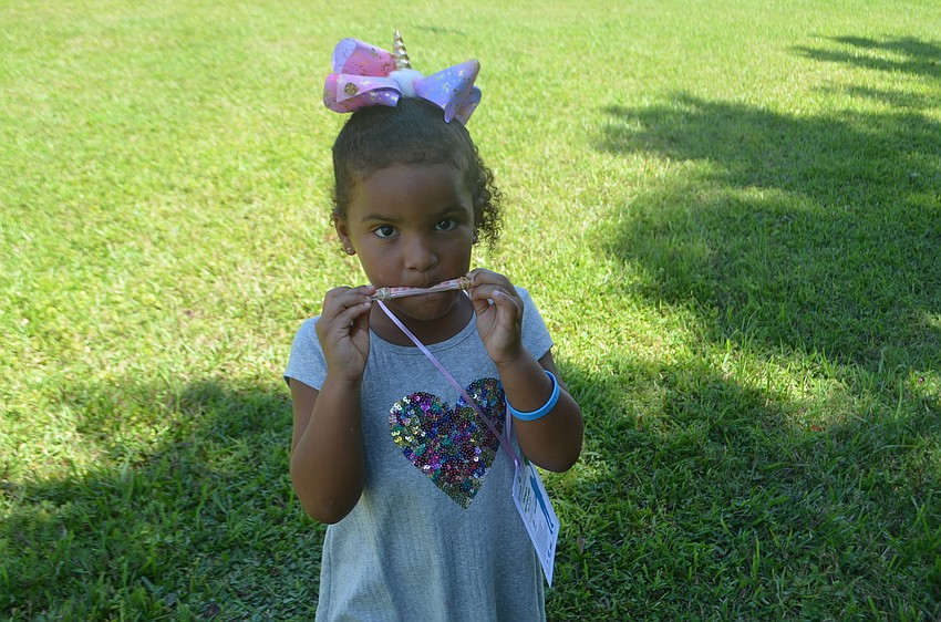 Osprey's Abigail James, 4, says she isn't old enough  to join Girl Scouts, but she will soon.