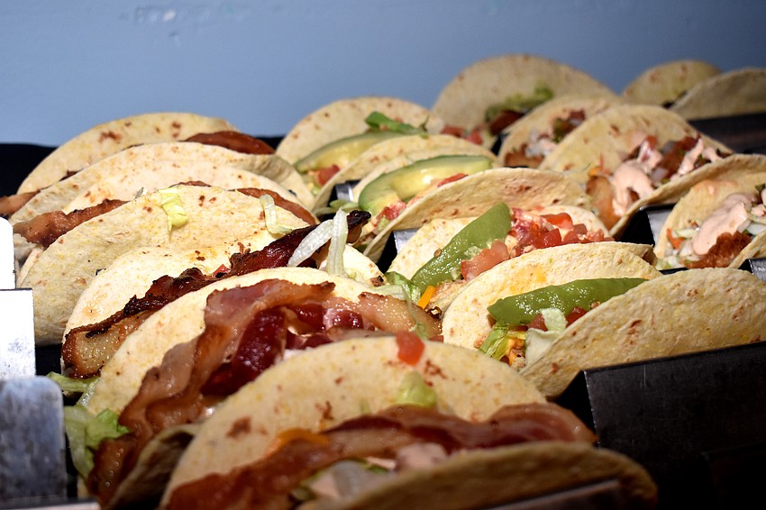 Attendees munched on tacos and other menu items from Surf Shack.