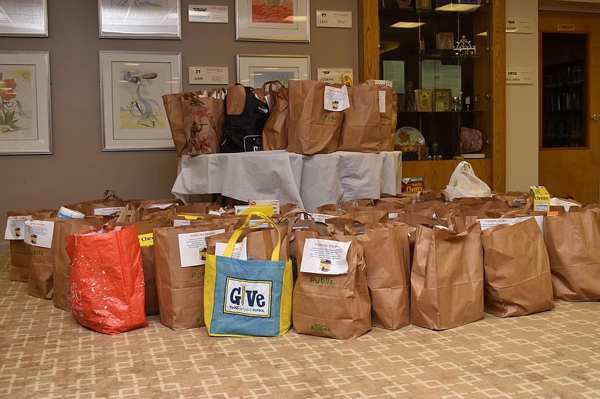 Temple Beth Israel members held a food drive for All Faiths Food Bank.