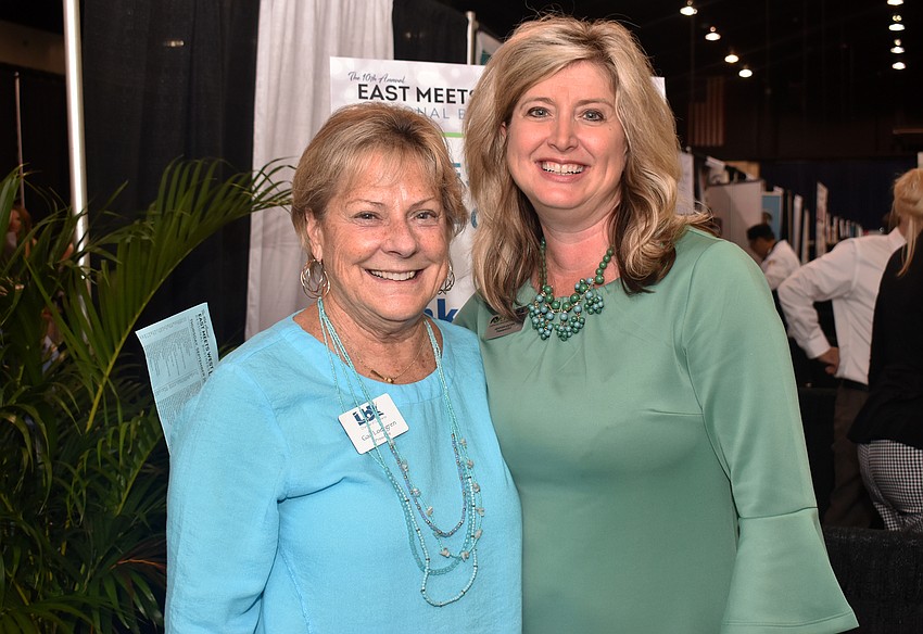 Longboat Key Chamber of Commerce President Gail Loefgren and Lakewood Ranch Business Alliance President Heather Kasten