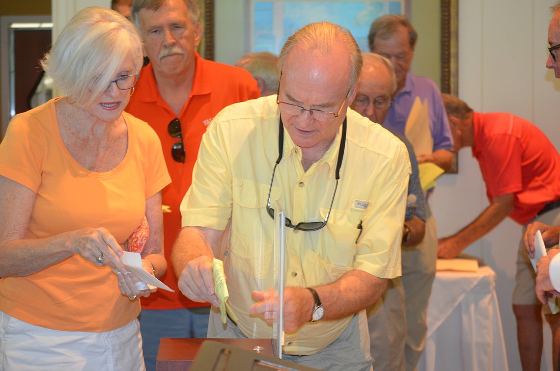 Mary Nell Moore and Mike Moore cast their votes Sept. 17 during the election for Recreation District supervisors. Photo by Amelia Hanks.