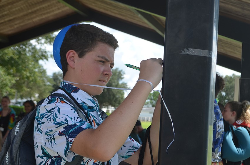 Greyson Bouchard, a 10th grader, says that Matthew Powers always could put a smile on his face.